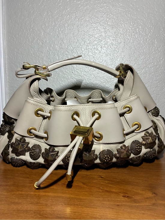 Burberry Handbags - Burberry Cream Leather Drawstring Hobo with Bronze Studs